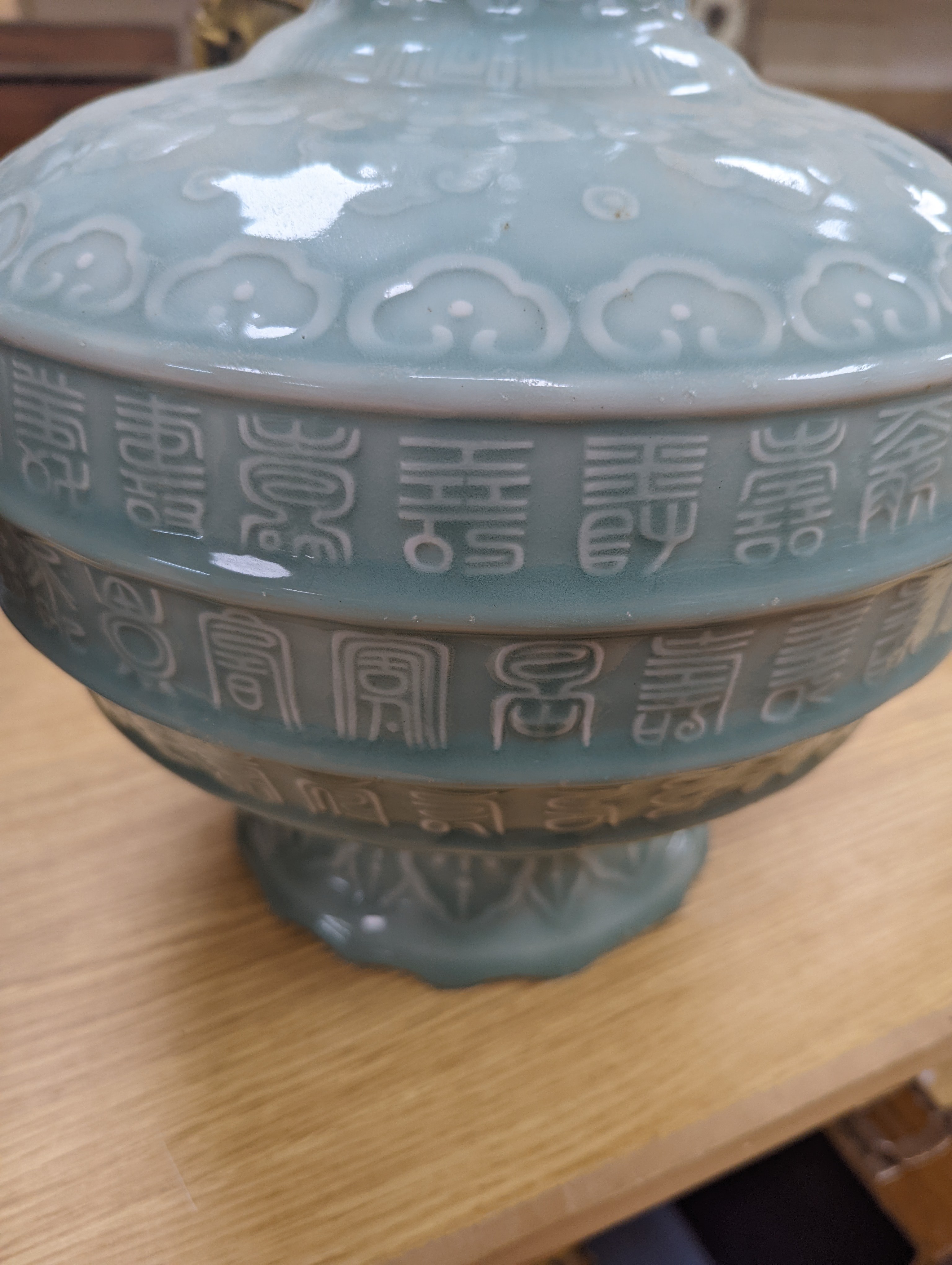 A large Chinese celadon glazed ‘Hundred Shou’ vase 41cm